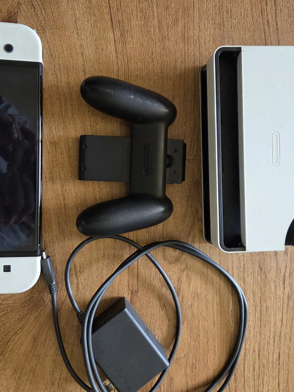 Nintendo Switch with White Joy‑Con Panels and Black Back